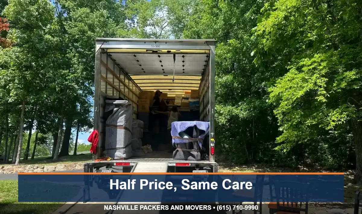 Nashville Packers and Movers box truck with ramp down at a Middle Tennessee home