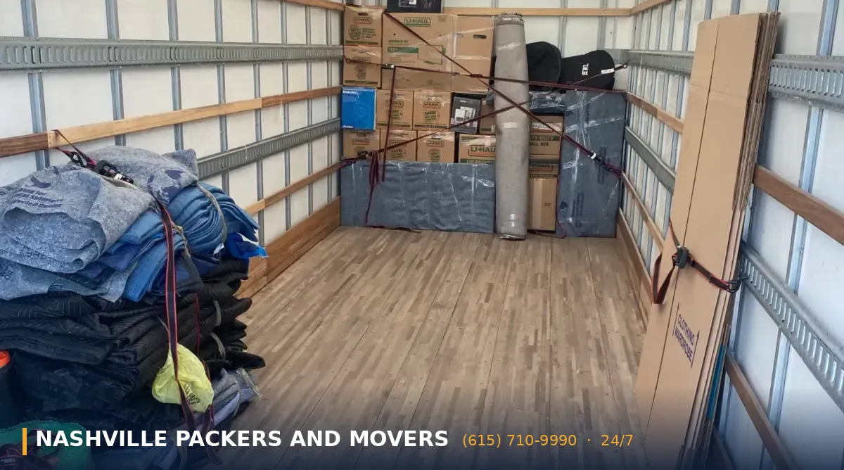 Emergency movers Nashville - packers and movers crew wrapping furniture for a last-minute night move