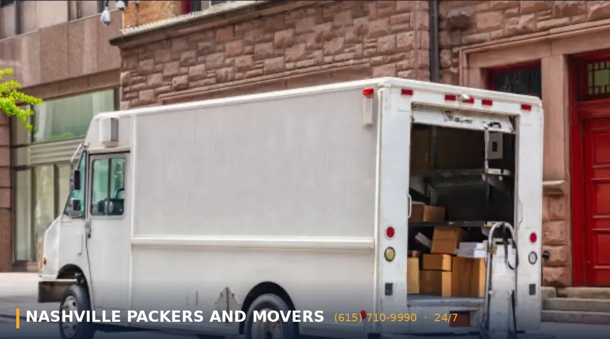 A team of professional movers in Nashville, TN, is seen carefully packing personal belongings into a moving truck, showcasing their commitment to customer satisfaction and stress-free moving services. The image highlights the experienced movers handling fragile items with care, emphasizing the quality and reliability of Nashville's local moving companies.