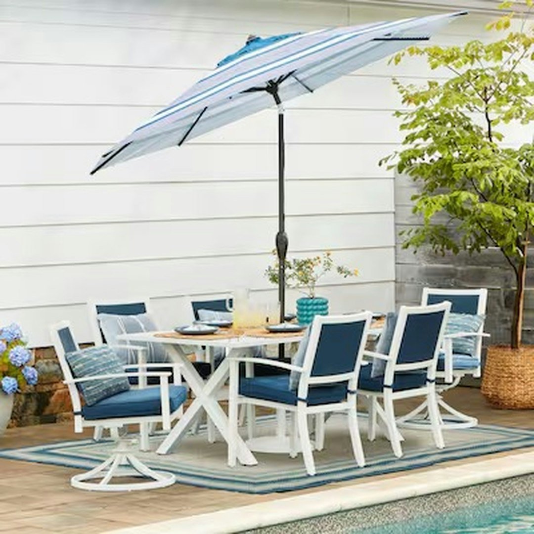 Fairview Packing: Patio Furniture and Outdoor Accessories 4 Outdoor dining table, chairs and umbrella beside a pool